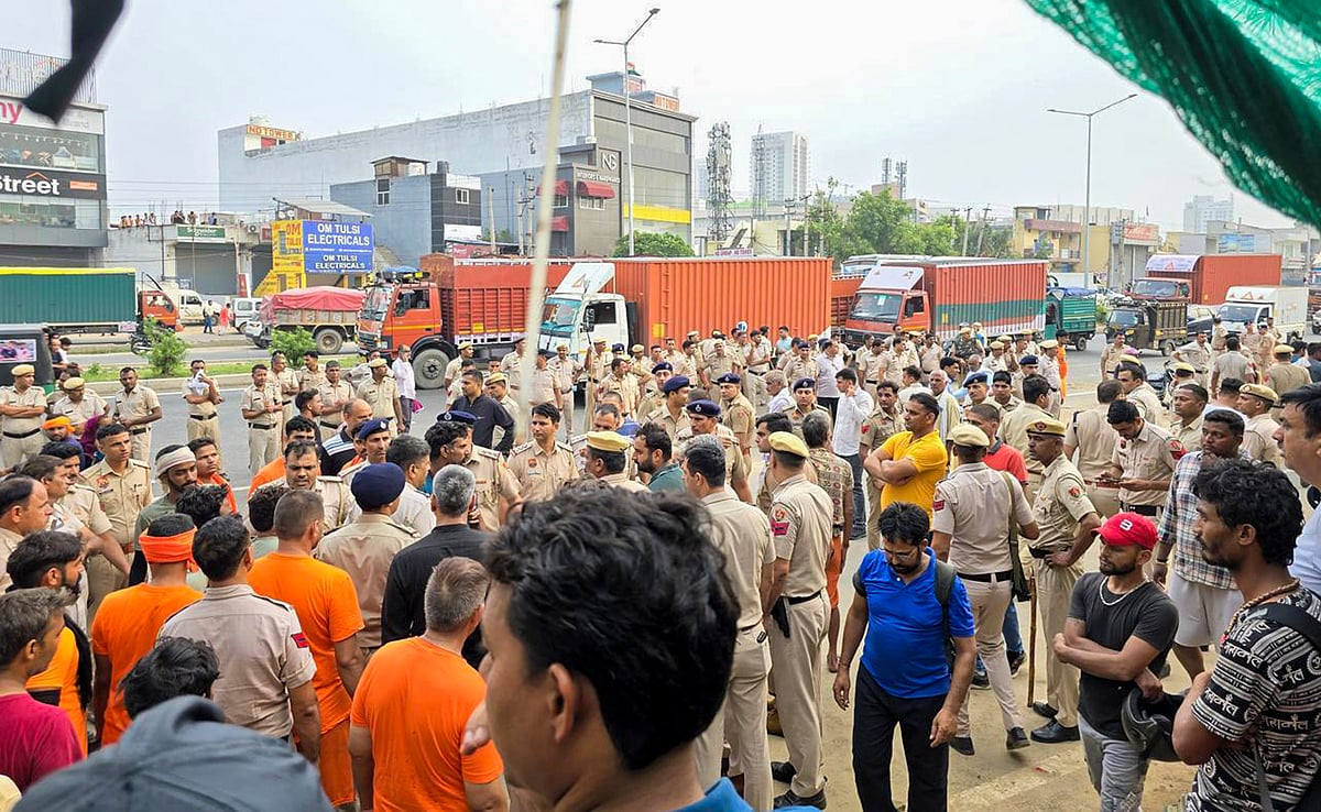 PTI : Police personnel conduct investigation after a 17-year-old kanwariya was killed while two of his associates were injured in a collision between their motorcycle and a speeding truck, triggering protests by kanwarias who blocked the Delhi-Jaipur highway, in Gurugram, Wednesday, July 31, 2024
